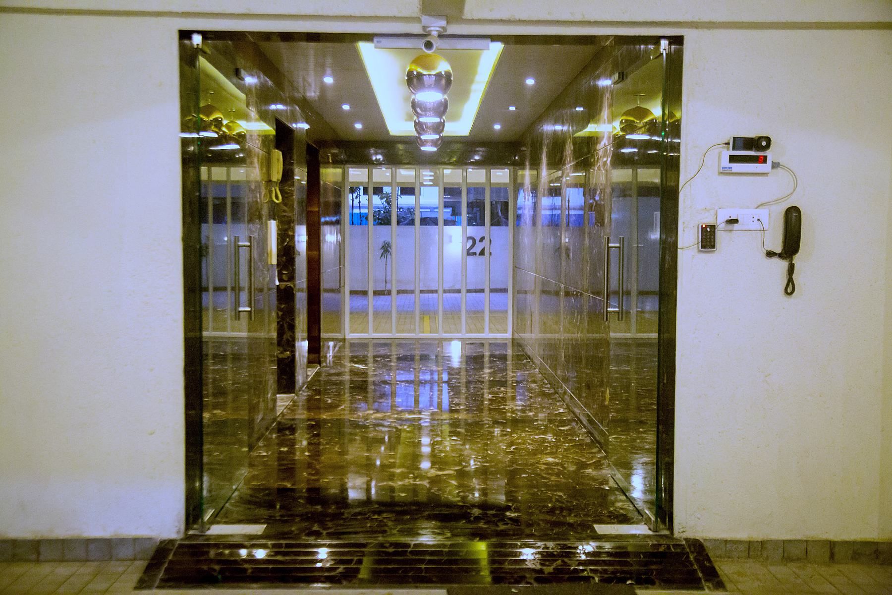 Glass entrance with intercom
